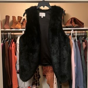 Black furry vest